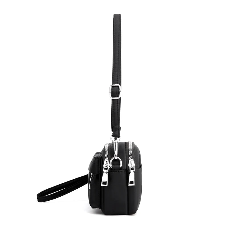 The Original VNZ Crossbody Clutch Wallet - Vennus